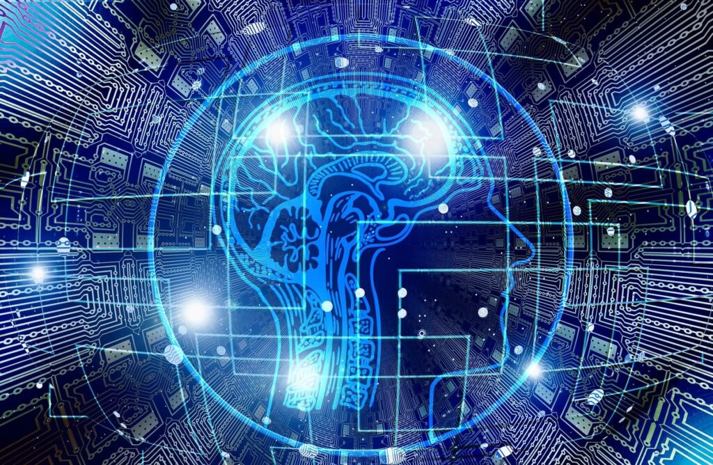 Digital illustration of a human head silhouette with a brain, overlaid on a circuit board background.