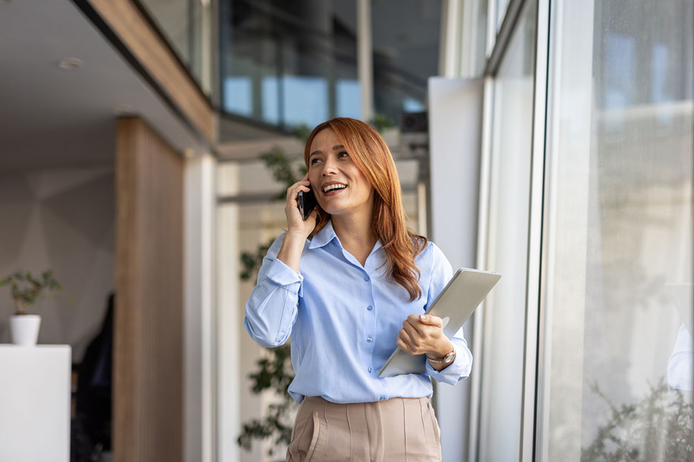 Female manager on cell phone.