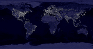 A world map showing Earth's cities illuminated at night, highlighting urban areas with bright clusters of lights.